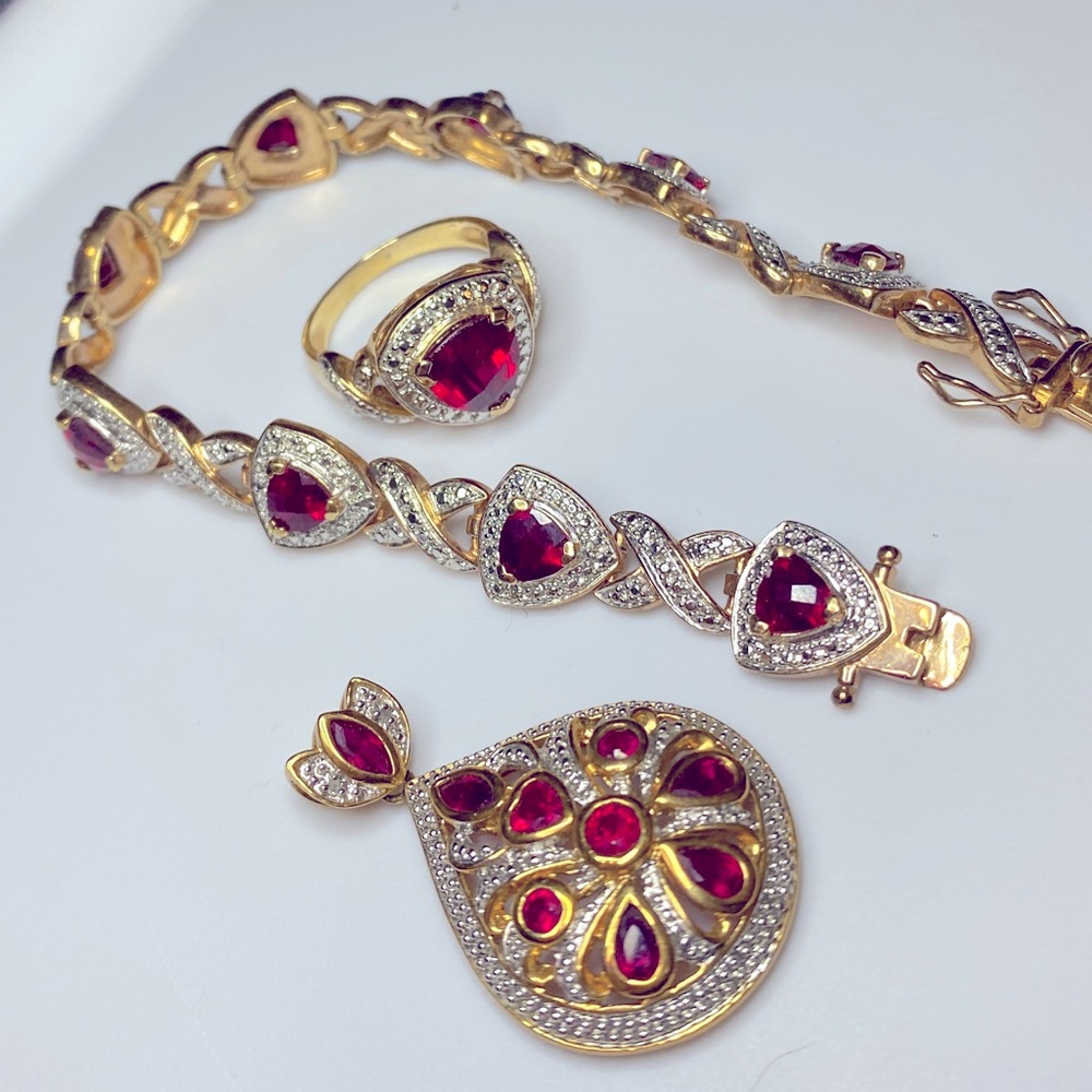 Gold plated bracelet, ring & matching pendant.